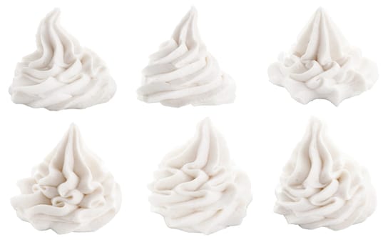 Set of decorative white swirls for dessert toppings conceptual of frozen yogurt, ice-cream or whipped cream, isolated on white