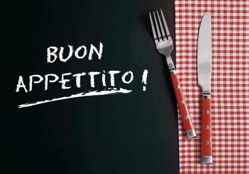 Close up Silverware on Red White Checkered Table Cloth at Buon Appettito