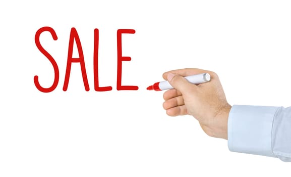 Hand with pen writes Sale