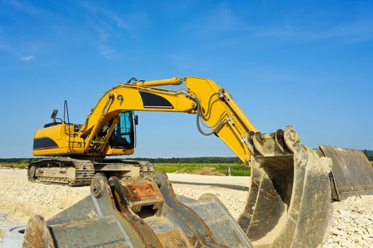 Bucket excavator on construction site