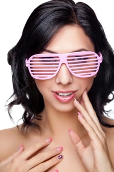 Young beautiful woman with perfect wearing pink glasses