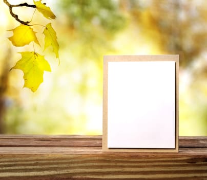 Handmade greeting card on shinning fall background