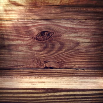 Aged rustic wooden boards with sun light