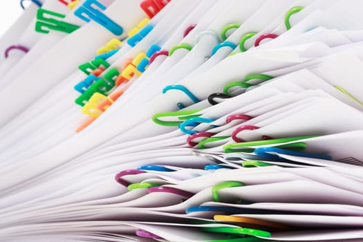 Pile of paper with colorful clips