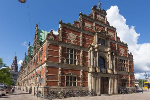 East side of the stock exchange building in Copenhagen with many bicycles