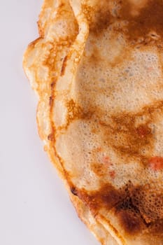 delicious fresh crepes pancakes pancakes on a white plate on a rustic white wooden board