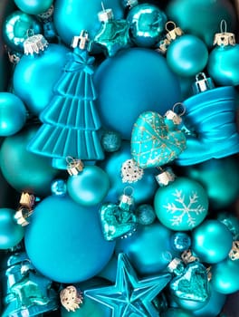 Various blue Christmas tree baubles as background