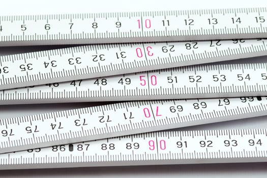 Detail of the folding meter rule - measure twice, cut once