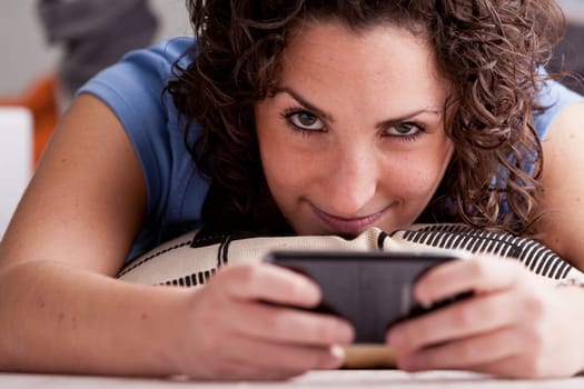 this girl is going to beat everyone on this mobile cell videogame