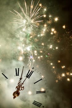 New Year's at midnight - Old clock with stars snowflakes and holiday lights