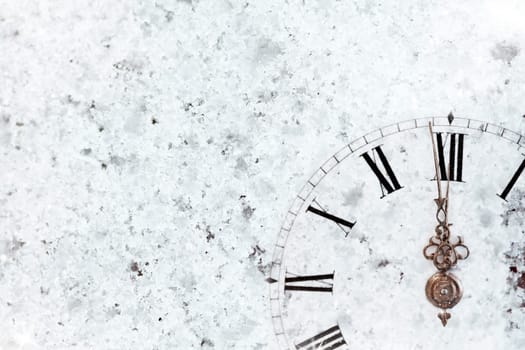 New Year's at midnight - Old clock with stars snowflakes and holiday lights