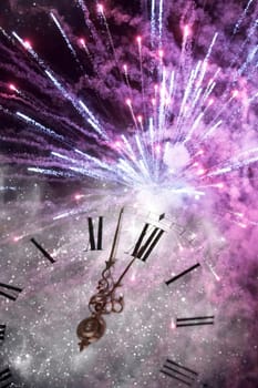 New Year's at midnight - Old clock with stars snowflakes and holiday lights