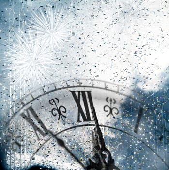 New Year's at midnight - Old clock with stars snowflakes and holiday lights