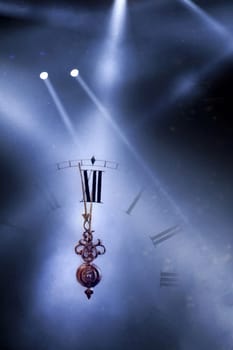 New Year's at midnight - Old clock with stars snowflakes and holiday lights