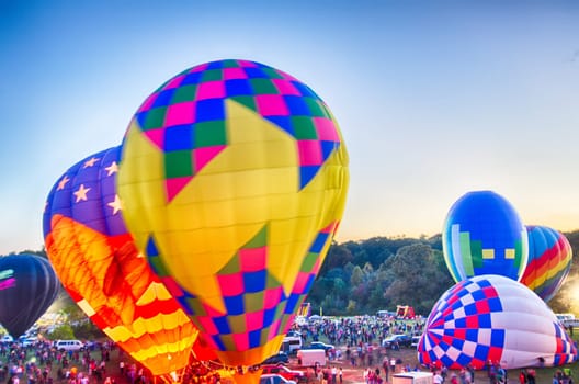 Bright Hot Air Balloons Glowing at Night