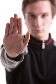 young adult stopping you with a raised hand