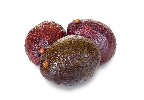 Three ripe avocados isolated on white background