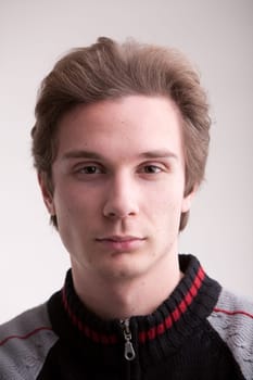young man looking into the camera, good looking