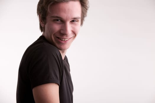 this young beautiful man is striking a pose