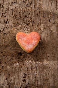 heart shaped bisquits on wooden rough table