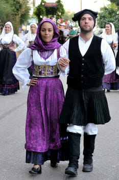 Jerzu, Sardinia - August 3, 2014: Parade of costumes and traditional masks of Sardinia at the Wine Festival August 3, 2014 in Jerzu, Sardinia.
