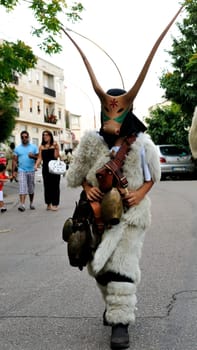 Jerzu, Sardinia - August 3, 2014: Parade of costumes and traditional masks of Sardinia at the Wine Festival August 3, 2014 in Jerzu, Sardinia.
