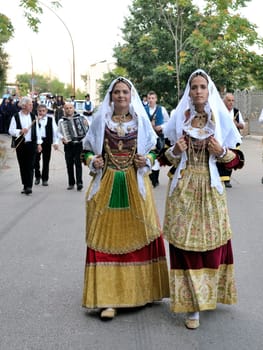 Jerzu, Sardinia - August 3, 2014: Parade of costumes and traditional masks of Sardinia at the Wine Festival August 3, 2014 in Jerzu, Sardinia.