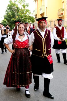 Jerzu, Sardinia - August 3, 2014: Parade of costumes and traditional masks of Sardinia at the Wine Festival August 3, 2014 in Jerzu, Sardinia.