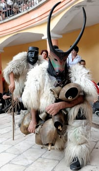 Jerzu, Sardinia - August 3, 2014: Parade of costumes and traditional masks of Sardinia at the Wine Festival August 3, 2014 in Jerzu, Sardinia.