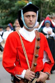 Jerzu, Sardinia - August 3, 2014: Parade of costumes and traditional masks of Sardinia at the Wine Festival August 3, 2014 in Jerzu, Sardinia.