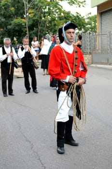 Jerzu, Sardinia - August 3, 2014: Parade of costumes and traditional masks of Sardinia at the Wine Festival August 3, 2014 in Jerzu, Sardinia.