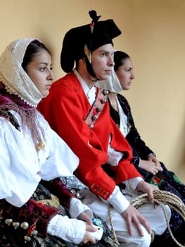 Jerzu, Sardinia - August 3, 2014: Parade of costumes and traditional masks of Sardinia at the Wine Festival August 3, 2014 in Jerzu, Sardinia.