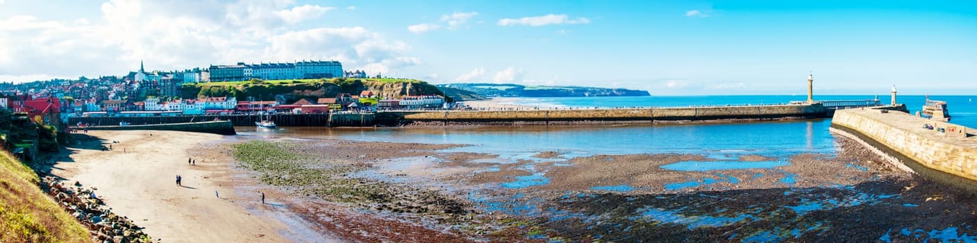 Scenic view of Whitby city in autumn sunny day.Whitby's attraction as a tourist destination is enhanced by its association with the world famous horror novel Dracula, written by Bram Stoker
