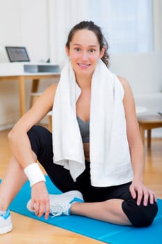 View of an attractive girl having rest after sport