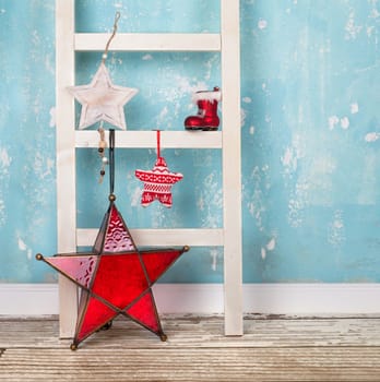 Christmas stars on decorative ladder