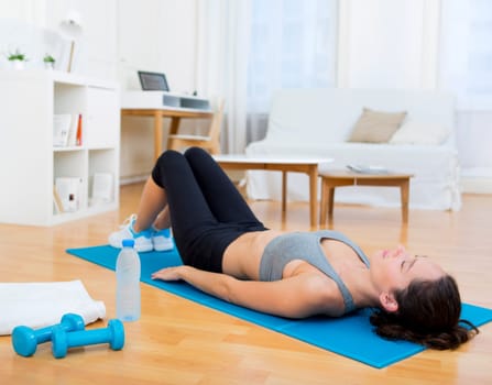 View of a Young attractive woman having a rest after sport