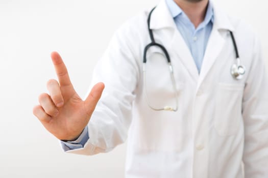 View of a Professional doctor touching a touchscreen  interface