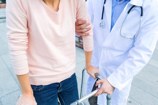 Close up view of a doctor helping patient