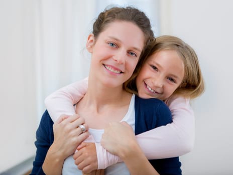 View of a Young girl hugging his sister
