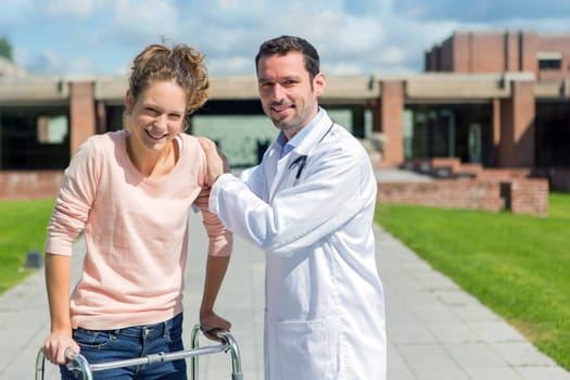 VIew of a Young doctor assisting a young woman