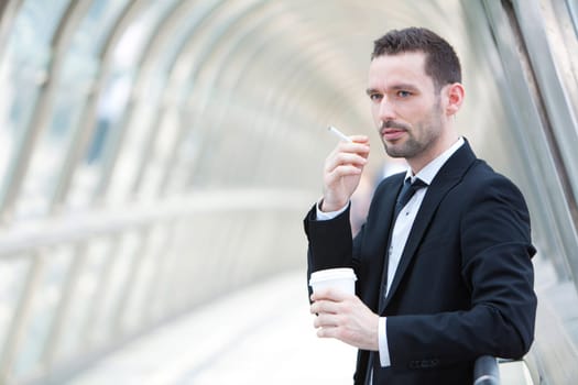View of an attractive businessman having a break
