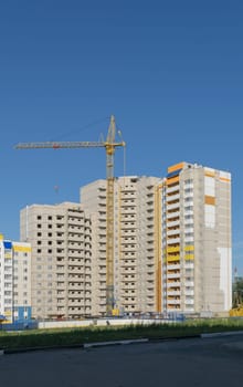 Construction of a new high-rise building. One tower crane