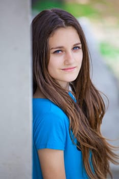 Outdoor portrait of beautiful teenage girl in spring.