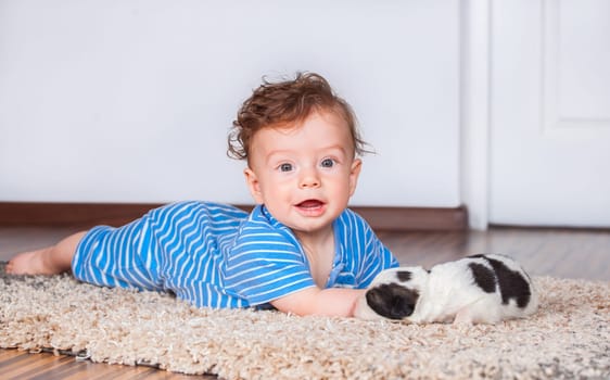 Portrait of a 7 months old baby boy at home.