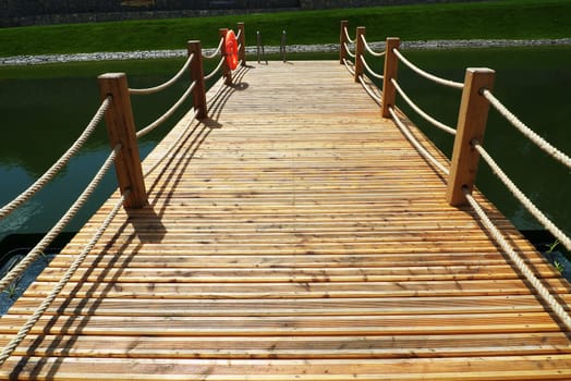 Deck on swimming pool in nature
