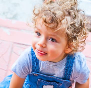 Portrait of 1 year old baby boy at home.