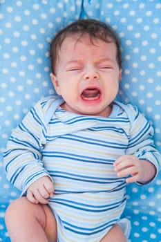 Portrait of a 2 months old baby boy at home.