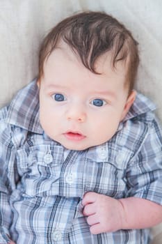 Portrait of a 2 months old baby boy at home.
