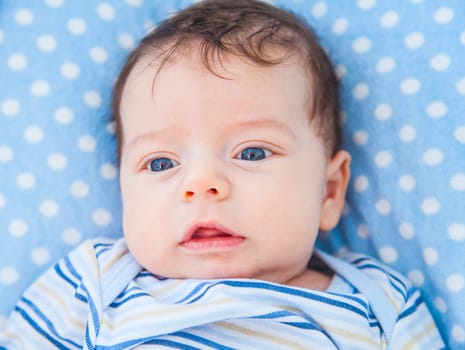 Portrait of a 2 months old baby boy at home.