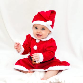 Little Baby Girl Dressed in Santa Costume